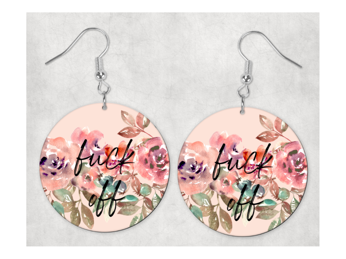A pair of 1-inch circle earrings with the phrase 'Fuck Off' displayed prominently, featuring a durable hook ear wire for secure wear.