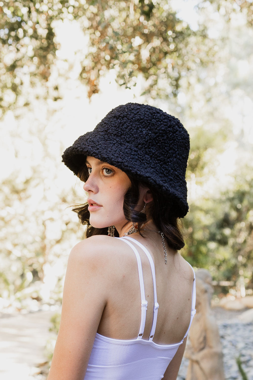 Teddy Suede Combo Reversible Bucket Hat in cozy teddy suede material, showcasing its stylish and versatile design.