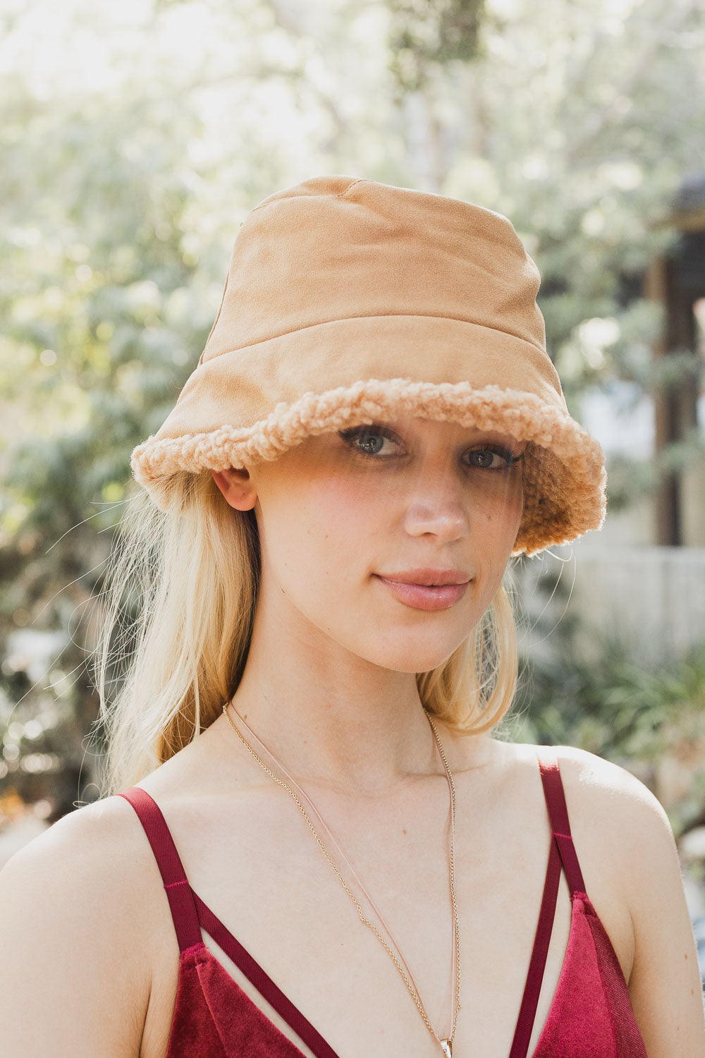 Teddy Suede Combo Reversible Bucket Hat in cozy teddy suede material, showcasing its stylish and versatile design.