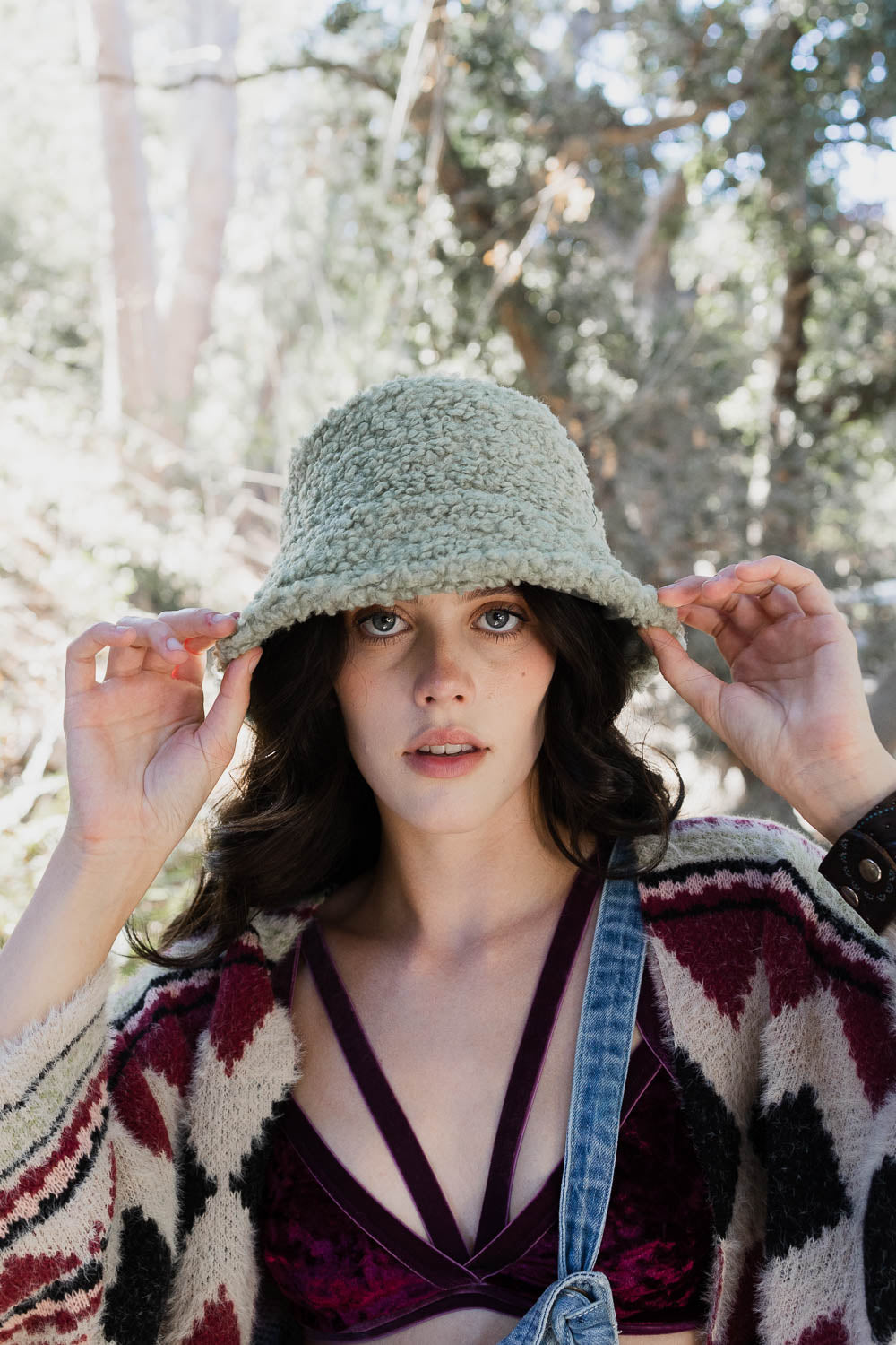 Teddy Suede Combo Reversible Bucket Hat in cozy teddy suede material, showcasing its stylish and versatile design.