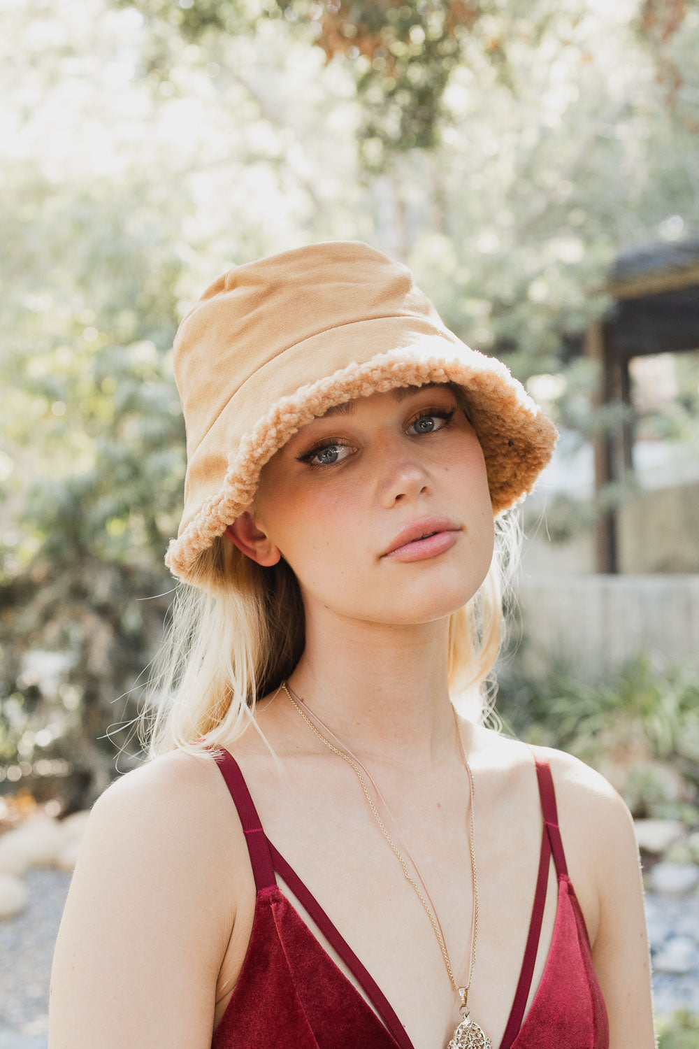 Teddy Suede Combo Reversible Bucket Hat in cozy teddy suede material, showcasing its stylish and versatile design.