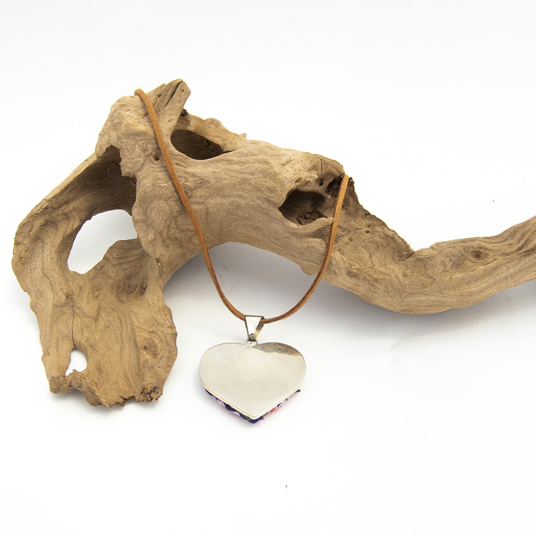 Colorful Tenango de Doria Embroidered Heart Necklace with unique Otomi embroidery on aluminum pendant.