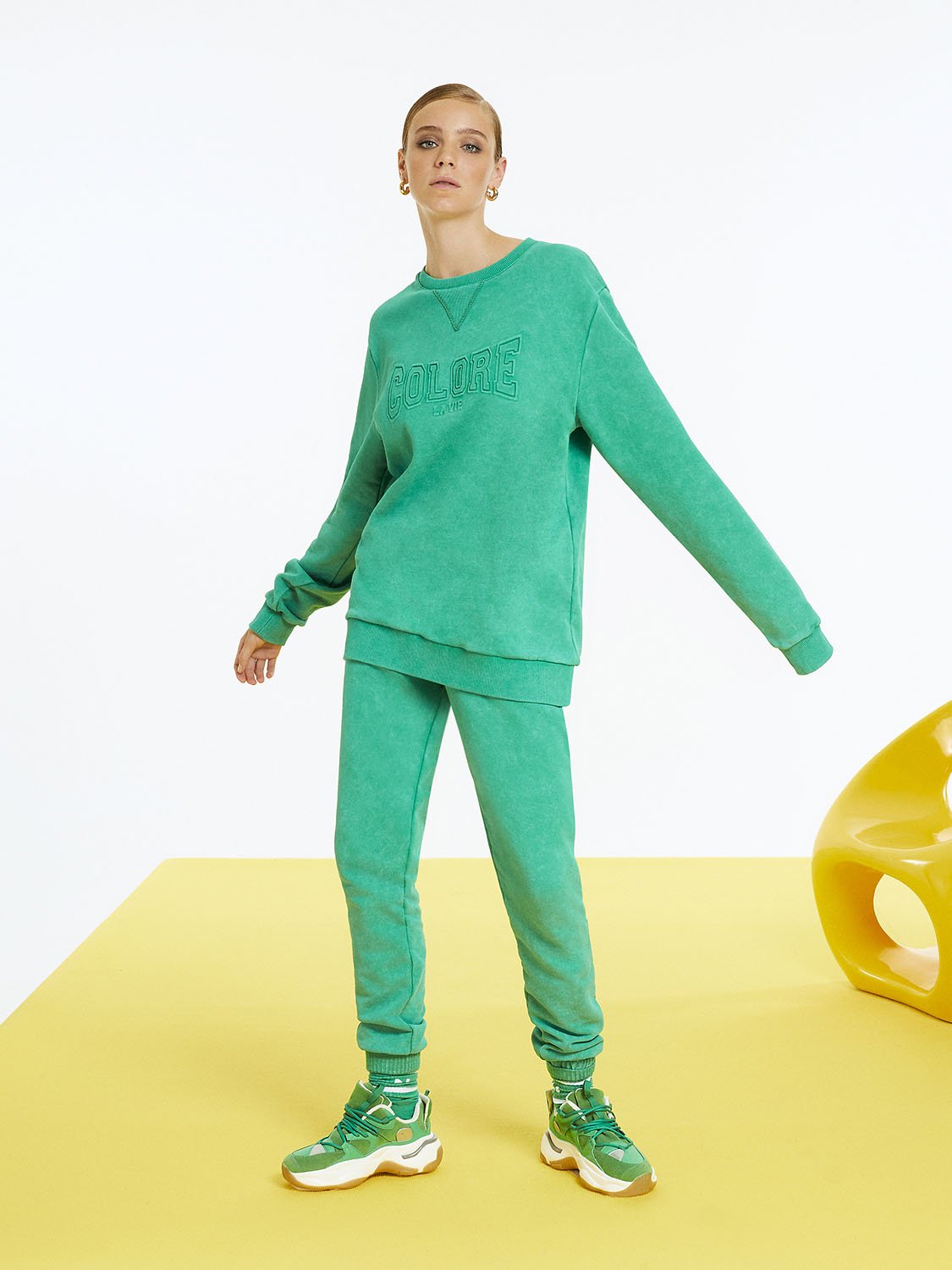 Text Print Oversized Sweatshirt featuring a crew-neck design and long sleeves with a stylish front text print detail.