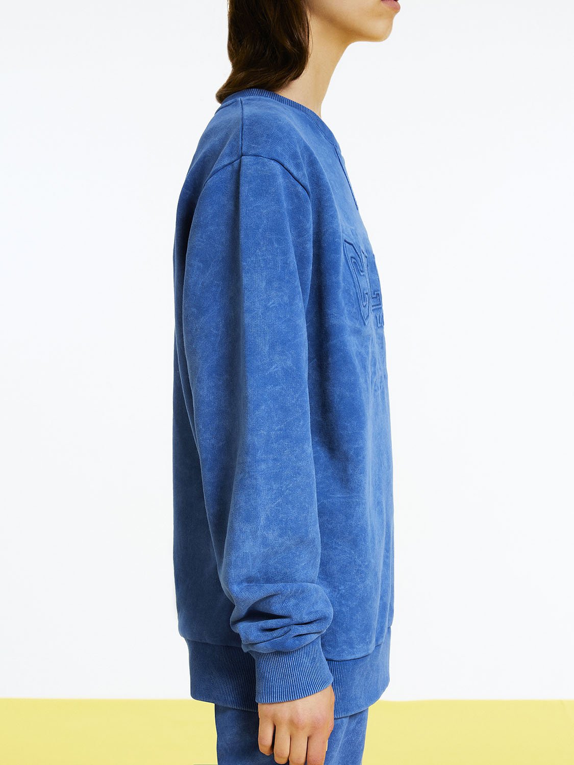 Text Print Oversized Sweatshirt featuring a relaxed fit, vibrant text print, and long sleeves, perfect for casual wear.