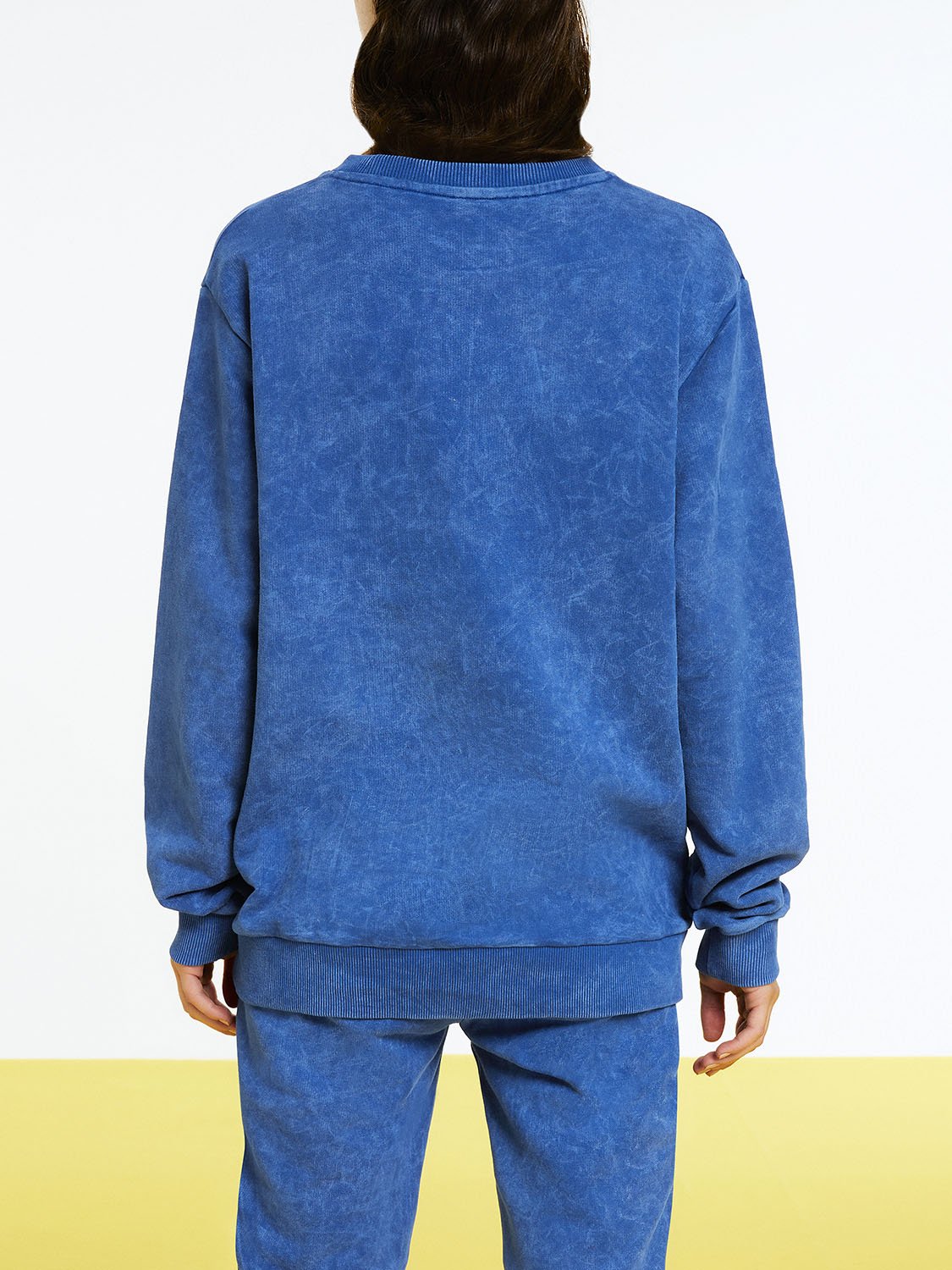 Text Print Oversized Sweatshirt featuring a relaxed fit, vibrant text print, and long sleeves, perfect for casual wear.