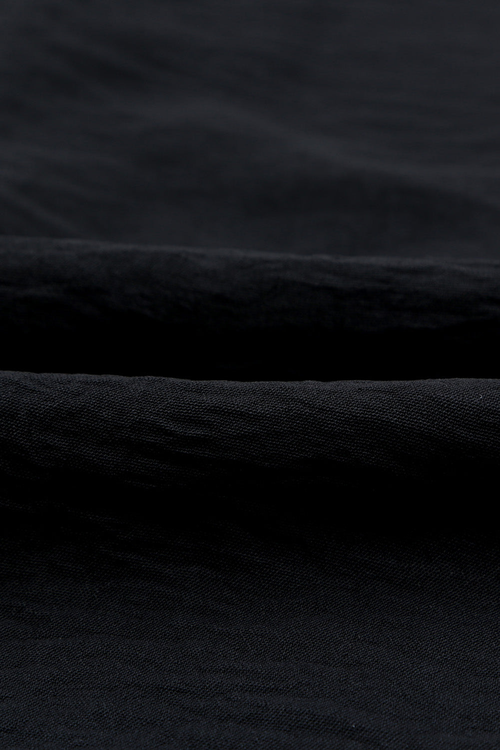 Textured Johnny Collar Three-Quarter Sleeve Blouse in a studio setting, showcasing its stylish design and textured fabric.