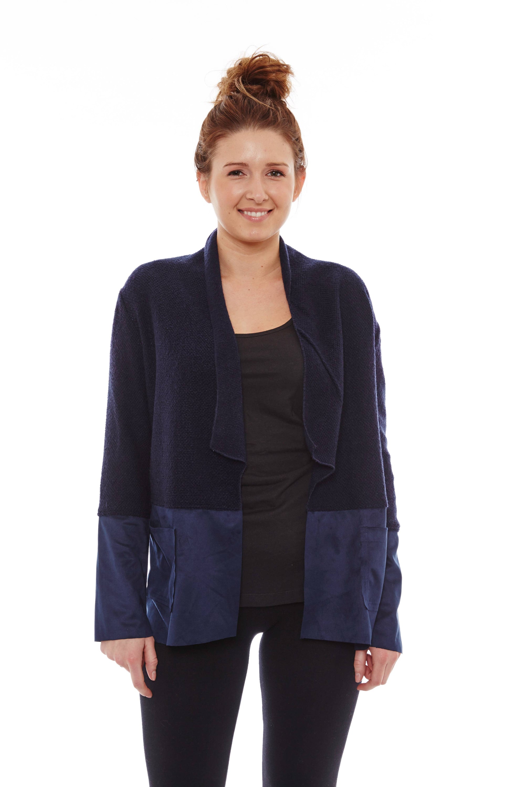 A cozy indigo blue cardigan with a loose fit, featuring large front patch pockets, perfect for layering and everyday wear.