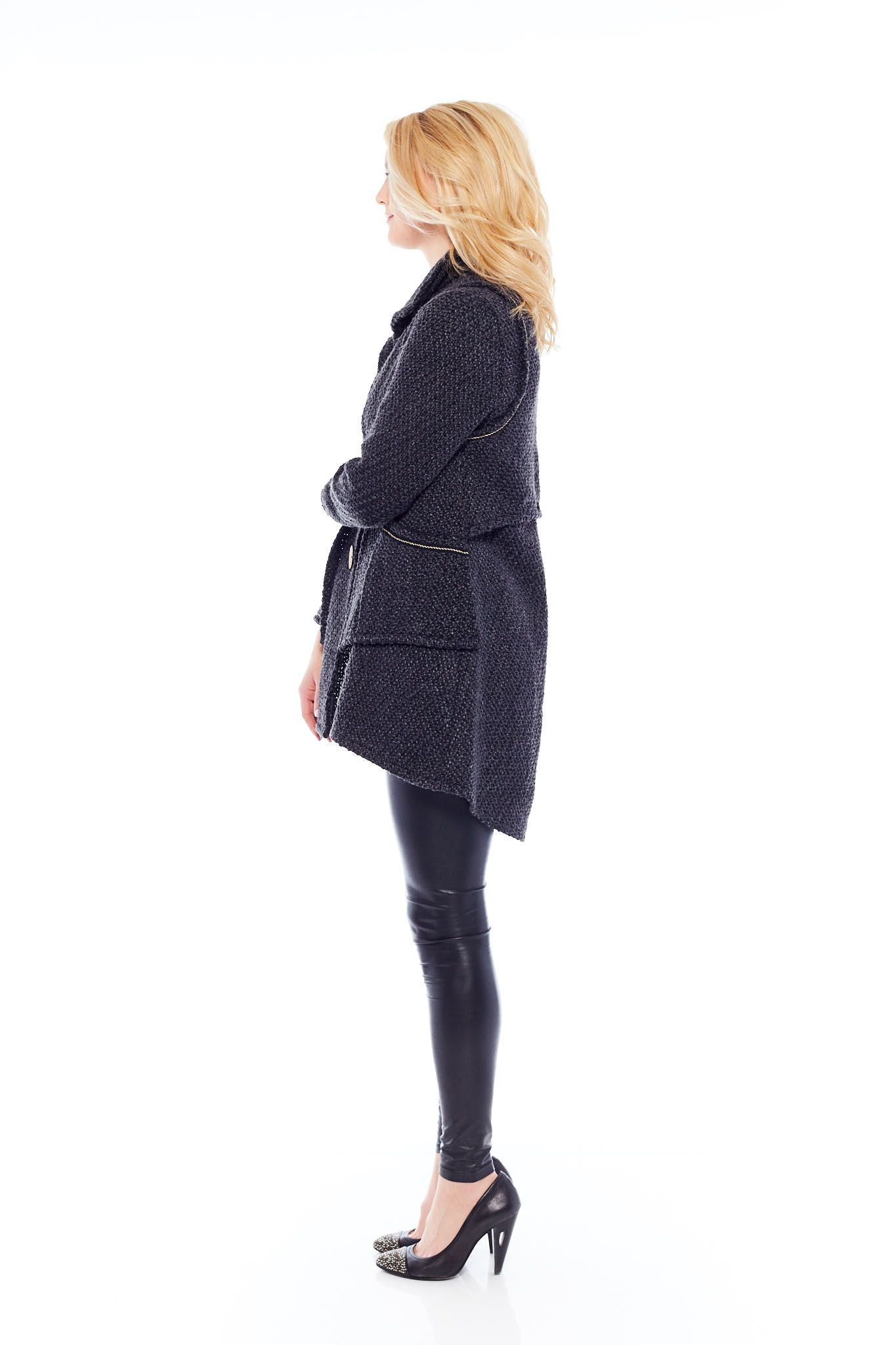 The All You Need Coat in Slate Grey, featuring a turned collar, long sleeves, and wooden buttons, elegantly falling below the knee.