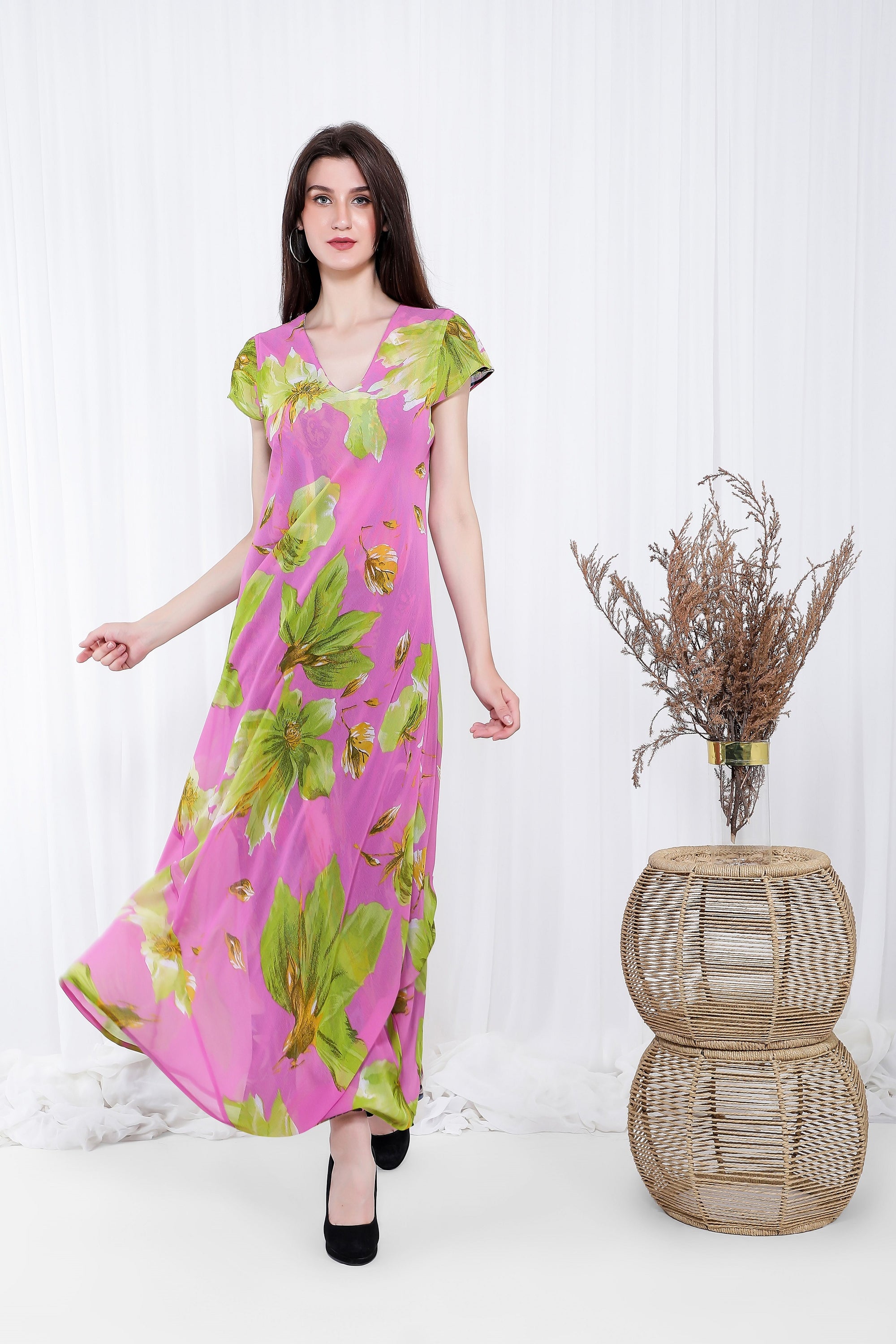 The Japan Feel Reversible Dress displayed in various prints, showcasing its versatility and elegant design.