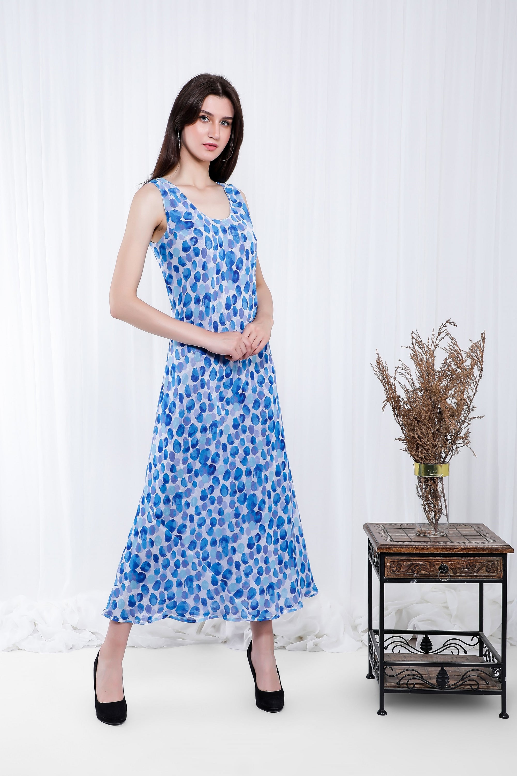 Light blue Polka Reversible Dress showcasing its elegant cowl neckline and versatile design, perfect for various occasions.