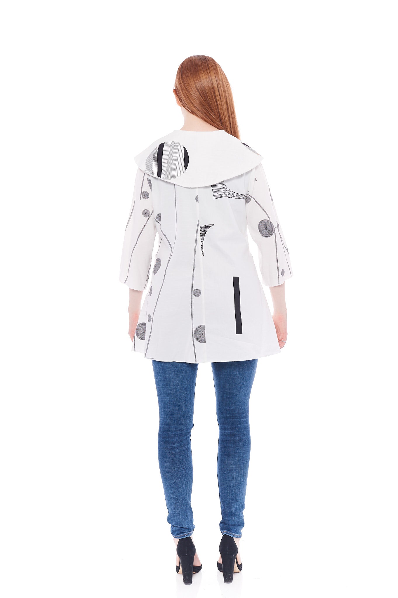 The Wholesome Polka Jacket in all white featuring long sleeves, button details, and a soft fabric blend, perfect for summer wear.