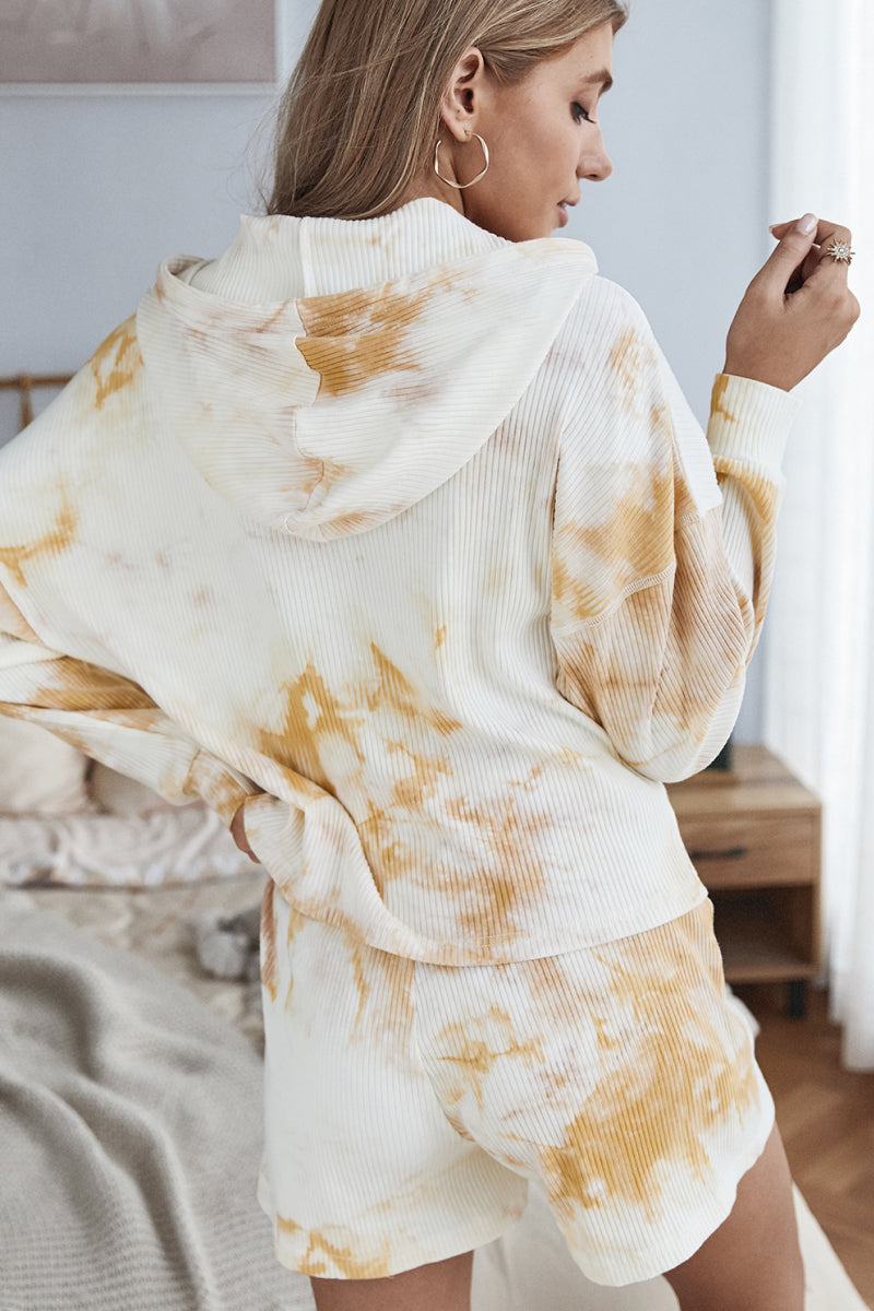 A stylish tie dye hoodie and shorts lounge set featuring a long sleeve hoodie and high waist shorts, perfect for casual wear.