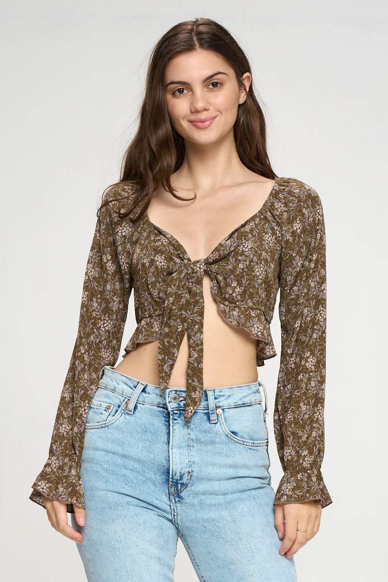 A stylish Tie Front Long Sleeve Crop Cardigan featuring a charming ditsy floral print, perfect for layering and versatile styling.