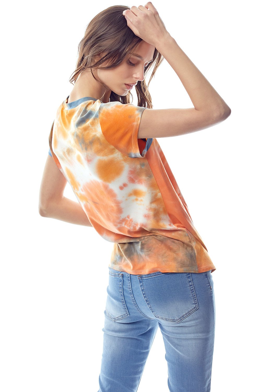 A vibrant tie dye jersey top featuring a crew neck and twist hem, designed with cap sleeves for a stylish and comfortable fit.