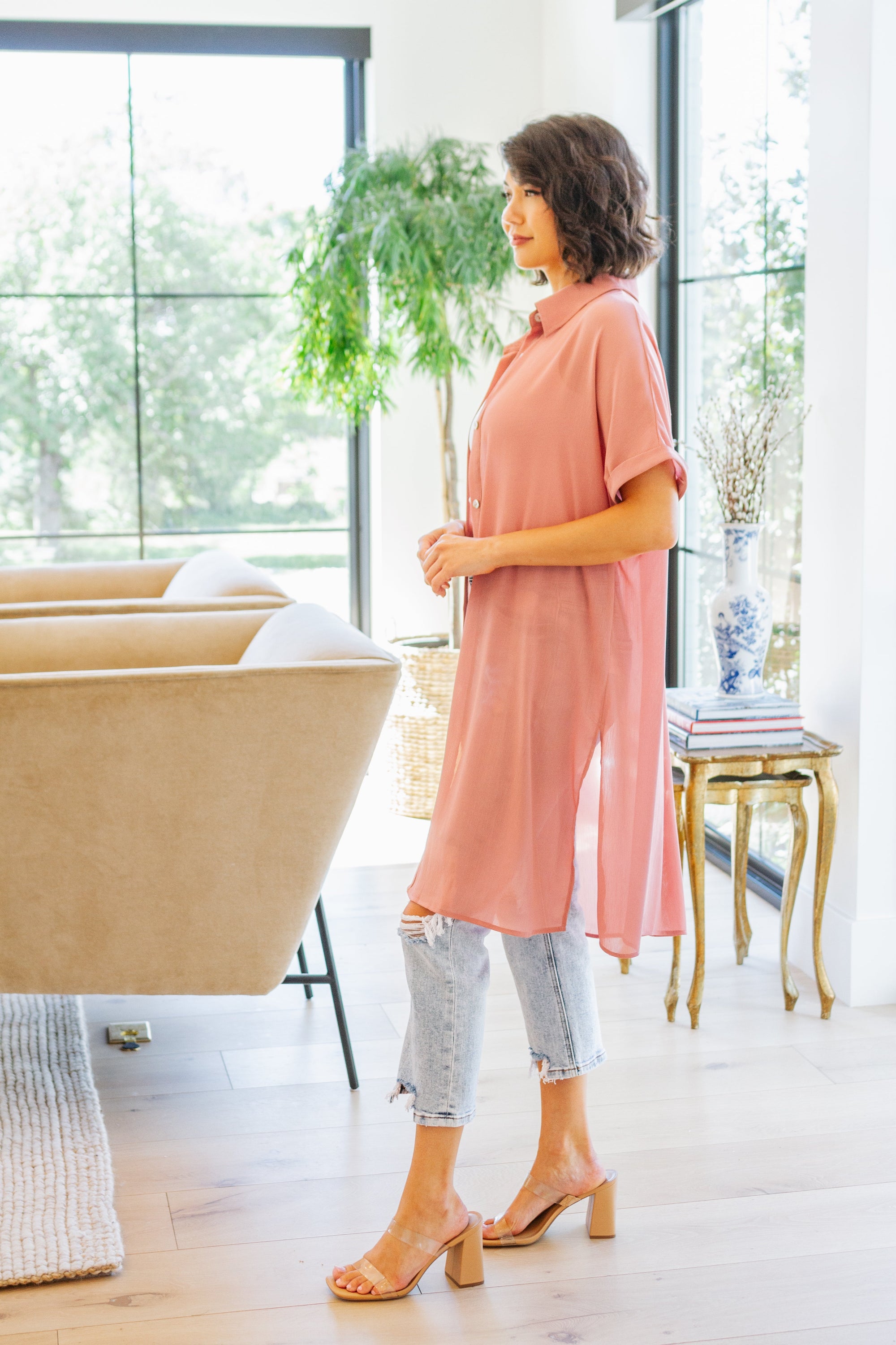 A stylish Timeless Appeal Shirtdress in sheer poly chiffon, featuring a collared design, button front, and side slits, perfect for any occasion.