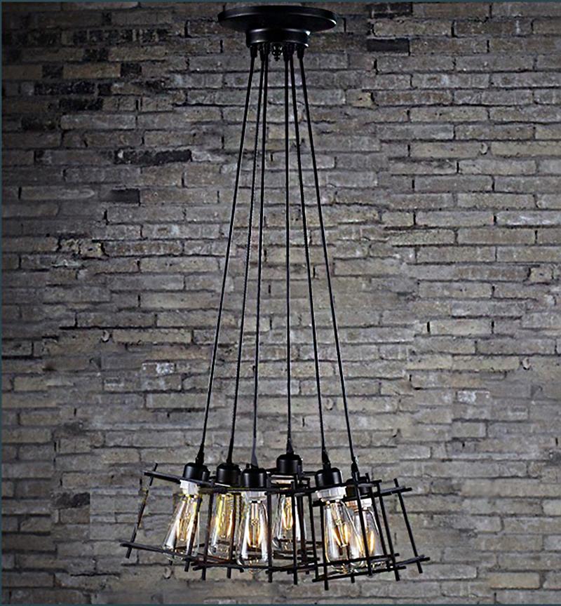 Titania 6-light black adjustable cord chandelier with six metal shades, perfect for contemporary indoor settings.