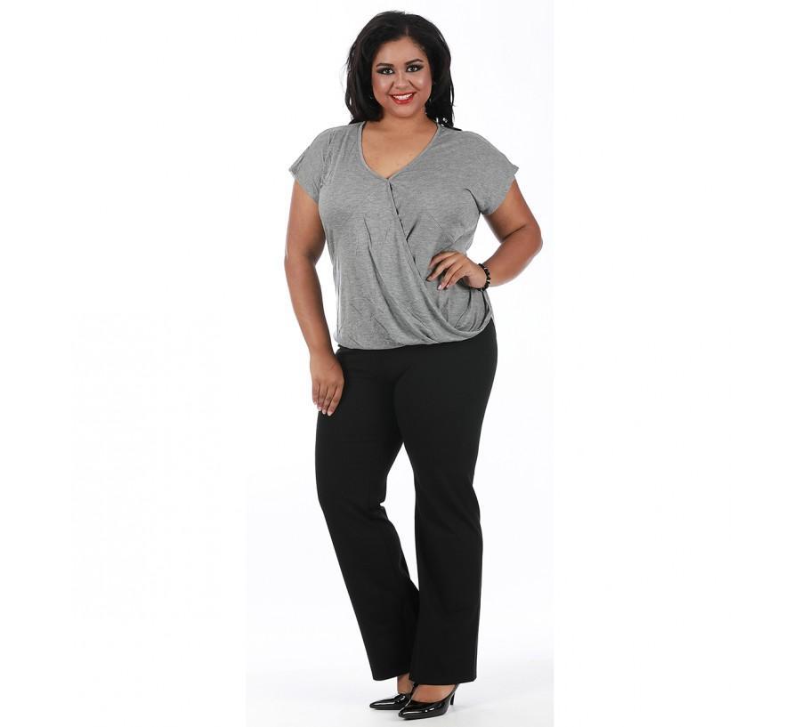 Stylish top featuring front overlap and lace inset, available in multiple colors.