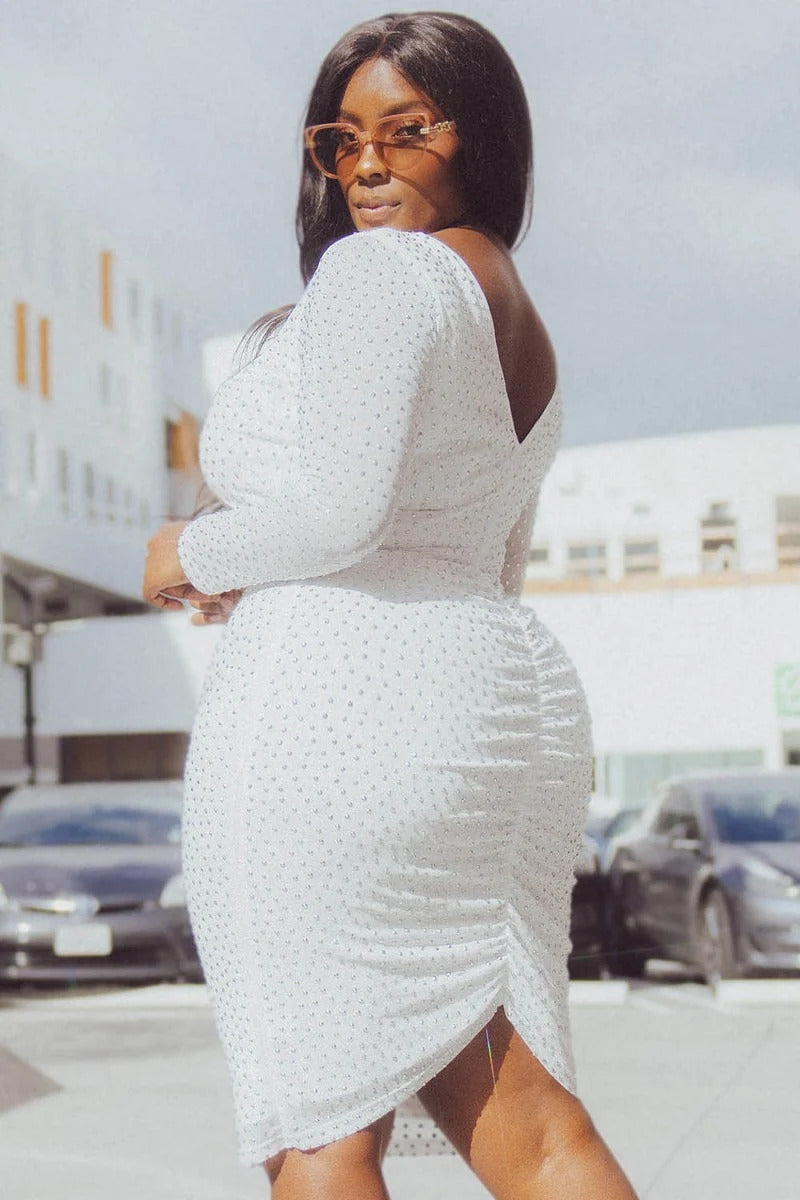 Translucent silver midi dress adorned with rhinestones, featuring sheer sleeves and a V-shape back, perfect for plus size women.