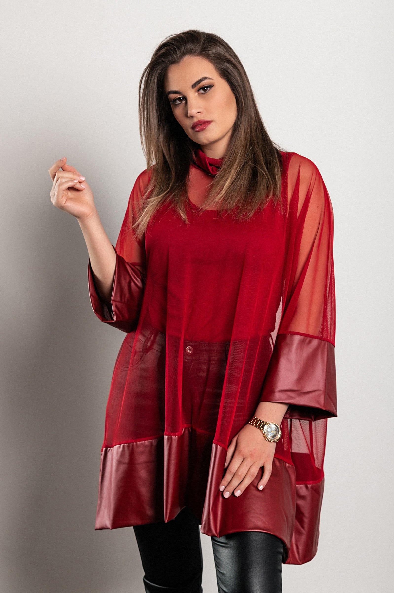 Burgundy transparent tunic featuring artificial leather and faux fur sleeves, stylish and loose-fitting design.