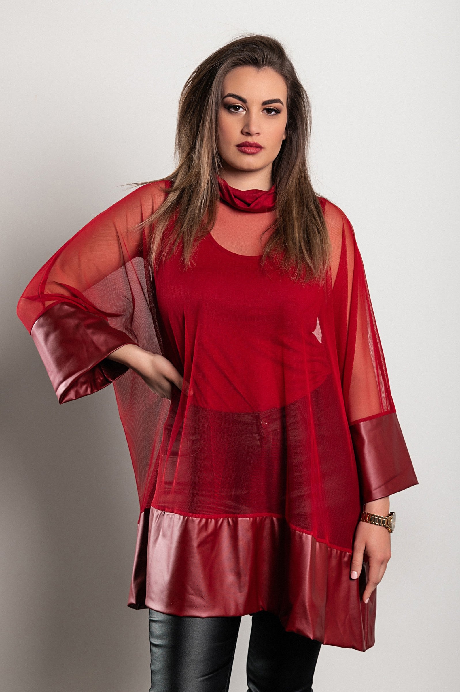Burgundy transparent tunic featuring artificial leather and faux fur sleeves, stylish and loose-fitting design.