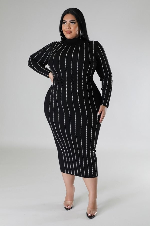 A stylish black turtle neck stretch dress with long sleeves and rhinestone detailing, perfect for various occasions.