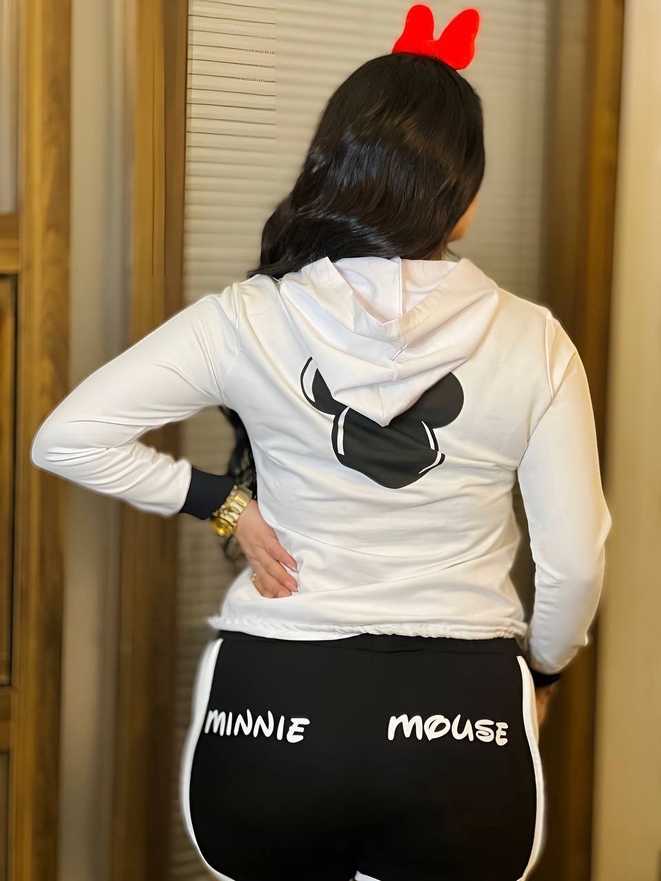Two-piece set featuring a Minnie Mouse long sleeve hoodie and matching shorts, perfect for young Disney fans.