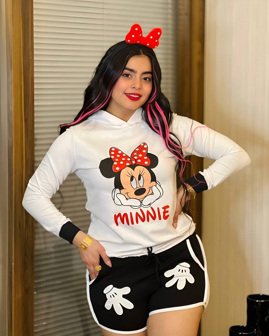 Two-piece set featuring a Minnie Mouse long sleeve hoodie and matching shorts, perfect for young Disney fans.