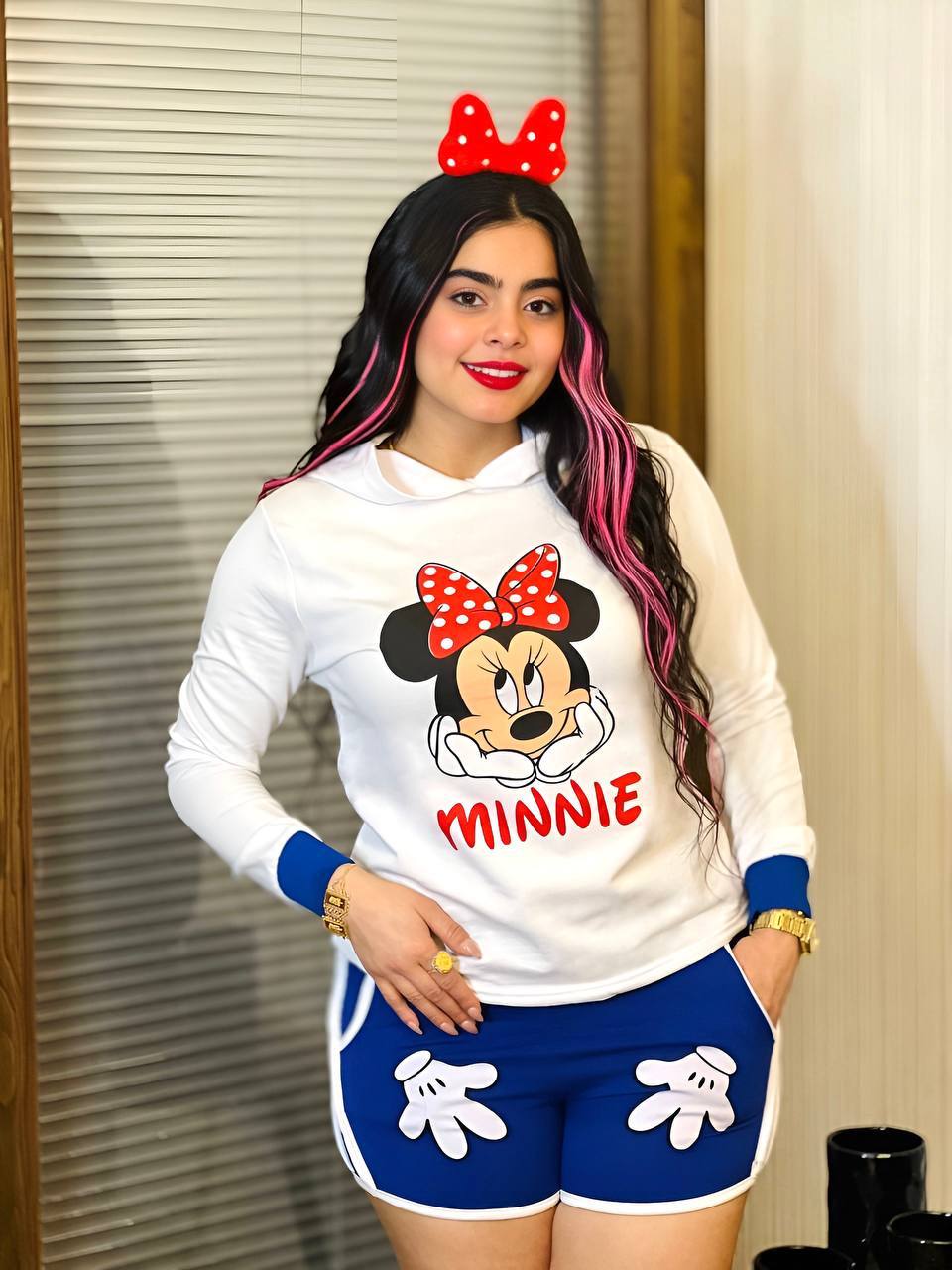 Two-piece set featuring a Minnie Mouse long sleeve hoodie and matching shorts, perfect for young Disney fans.