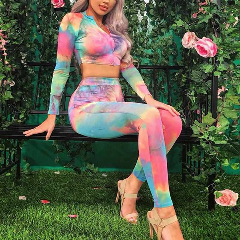 A stylish two-piece suit jumpsuit for women featuring a trendy tie-dye pattern, made from elastic polyester and spandex fabric, perfect for winter wear.