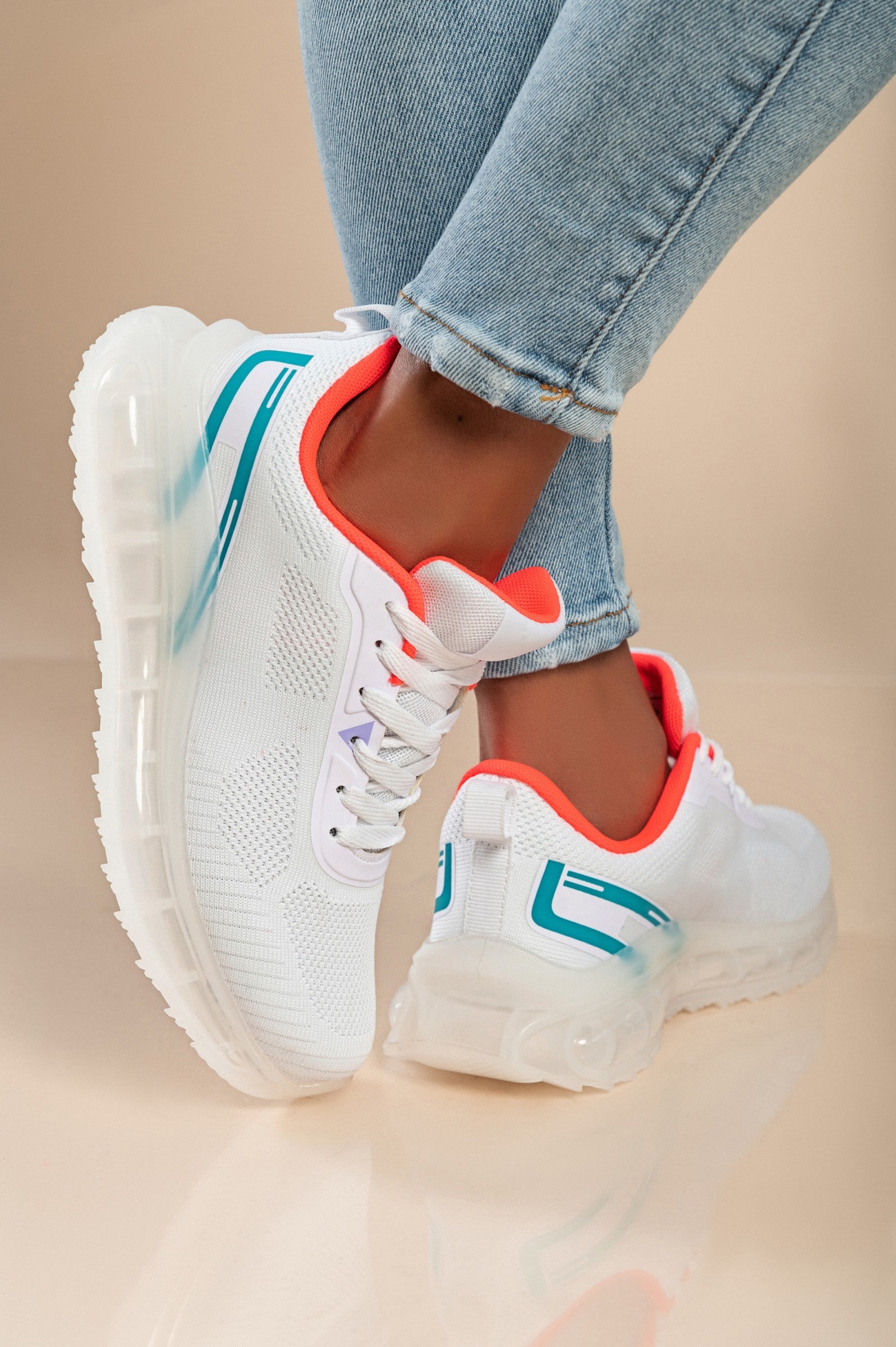 Stylish two-tone combination sneakers in white with a textile upper, round toe, and reinforced heel and toe for added comfort.