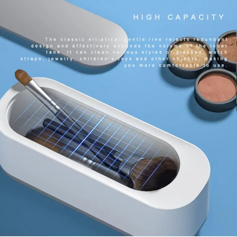 Portable ultrasonic cleaner machine designed for effective jewelry and eyeglass cleaning with high-frequency vibrations.