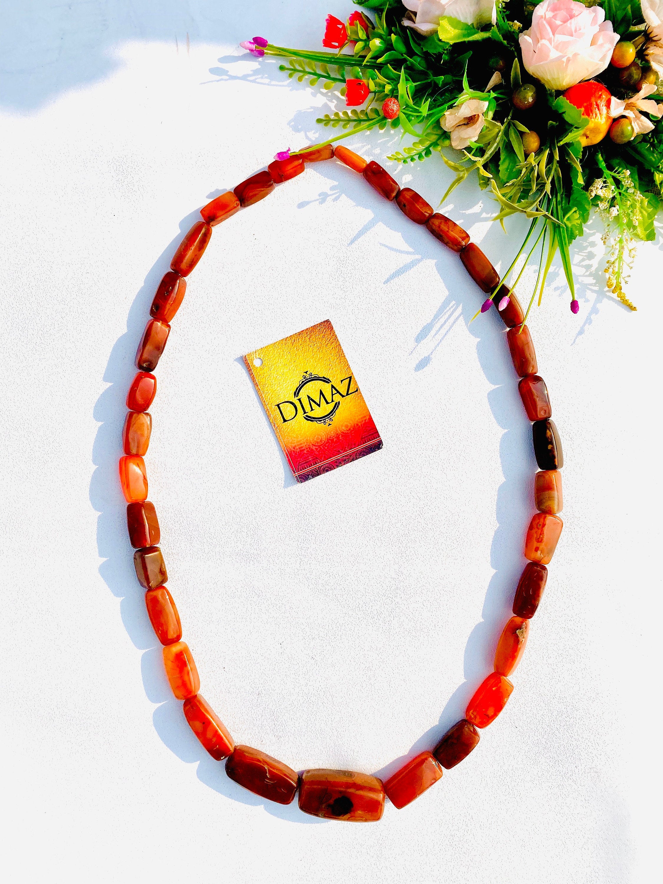 A vibrant unisex African beads bangle showcasing intricate designs and colors, perfect for enhancing any outfit.