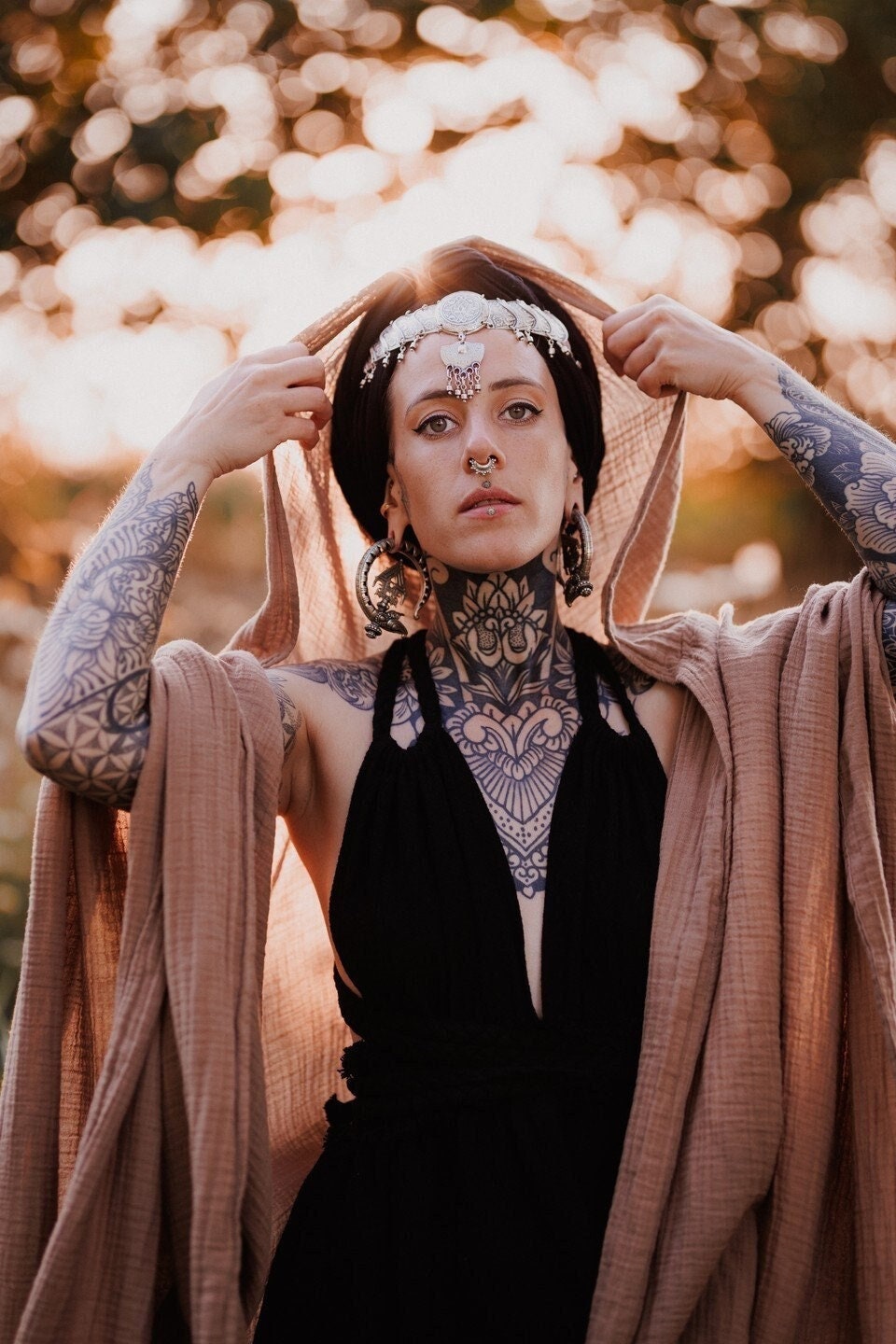 A soft and stylish unisex cotton hooded cloak kaftan, perfect for meditation and relaxation, featuring a natural fabric and a comfortable fit.