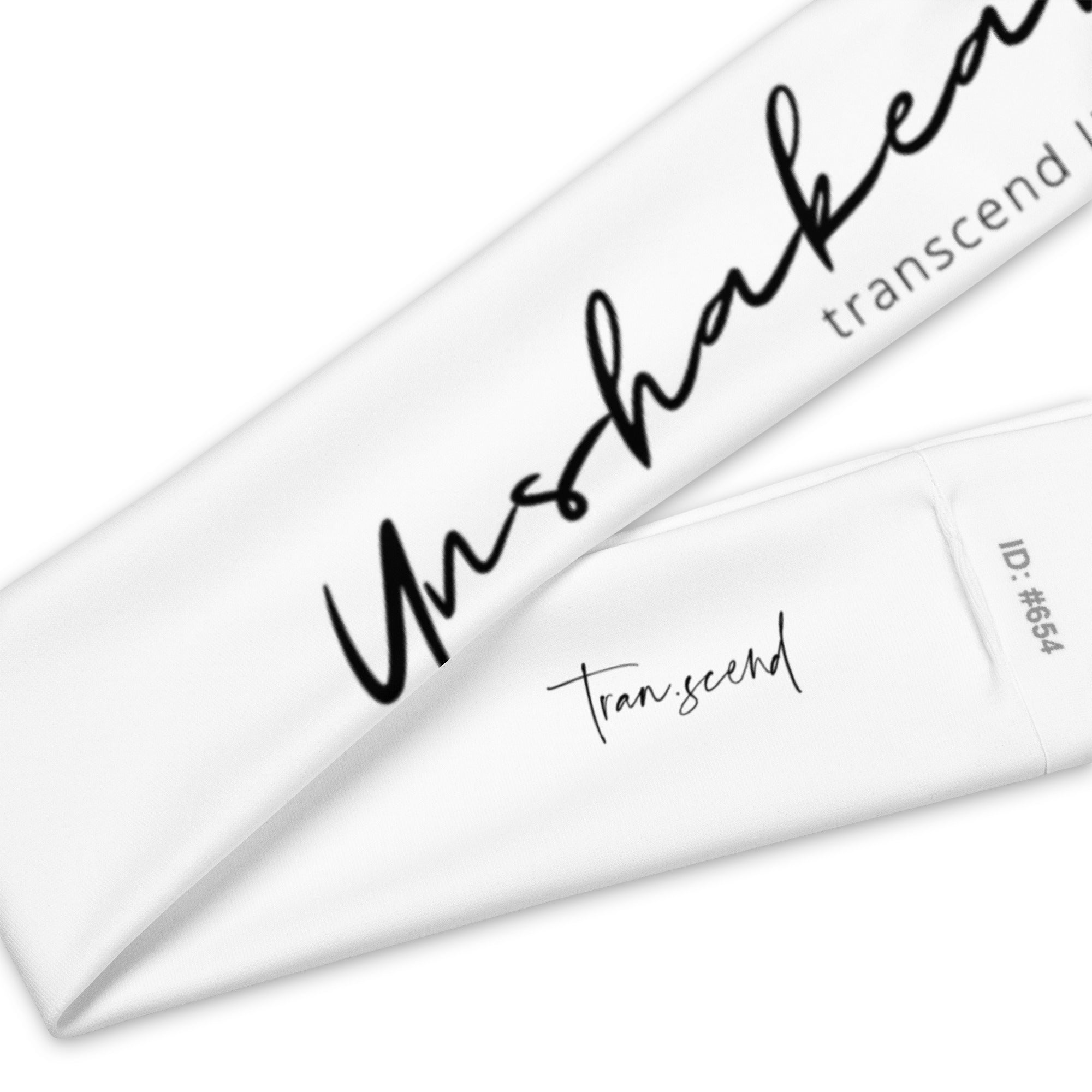 A soft and stretchy Unshakeable Headband in various colors, designed for workouts and casual wear.