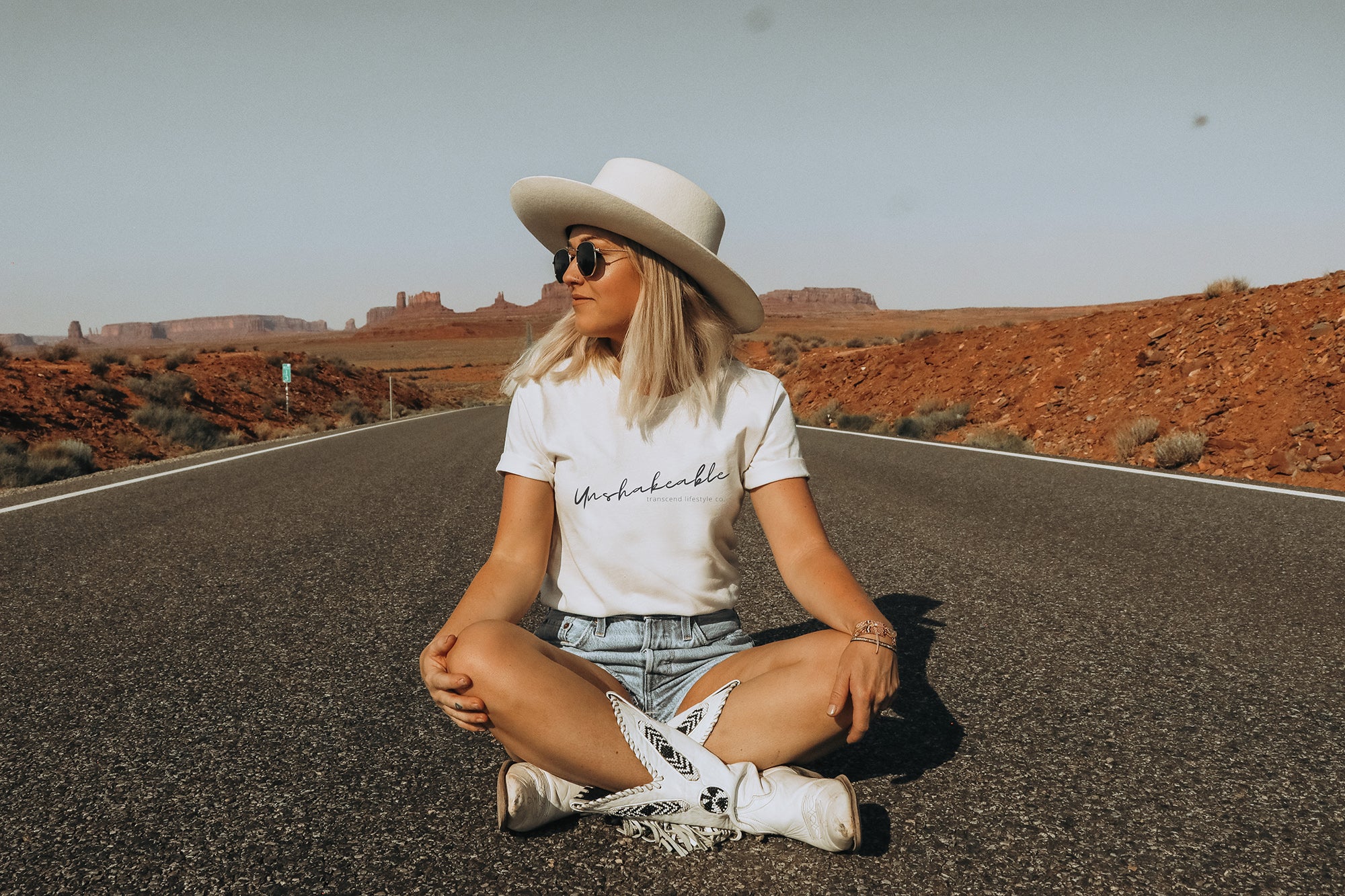 Unshakeable Women's Fitted Tee in various colors, showcasing its soft fabric and feminine silhouette.