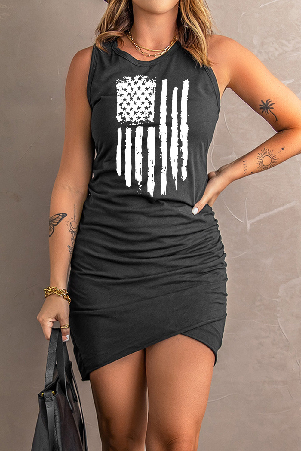 US Flag Graphic Tulip Hem Ruched Sleeveless Dress showcasing a chic design with a patriotic flag pattern, perfect for summer outings.