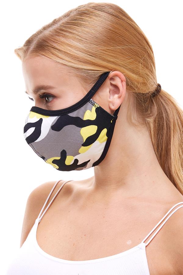USA made camouflage fashion cloth face mask in coral and yellow, featuring stretchable ear loops for a secure fit.