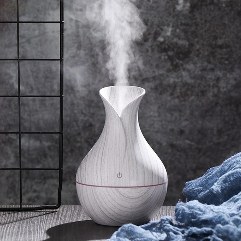 USB Aroma Air Humidifier with wood grain finish and LED lights, designed for cool mist and healthy air.