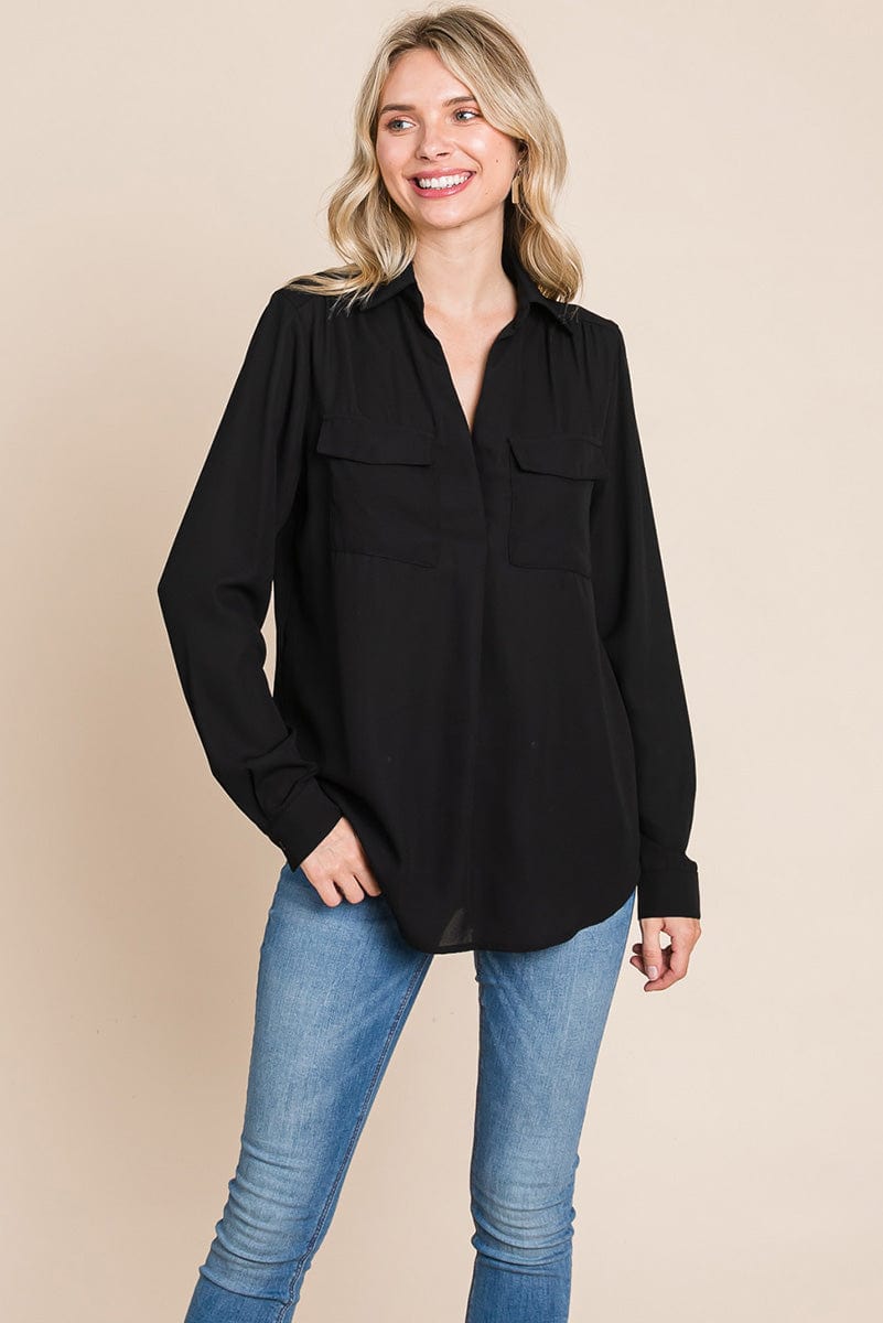 A stylish V neck collared blouse with two front pockets, featuring long sleeves and a button front, displayed on a mannequin.