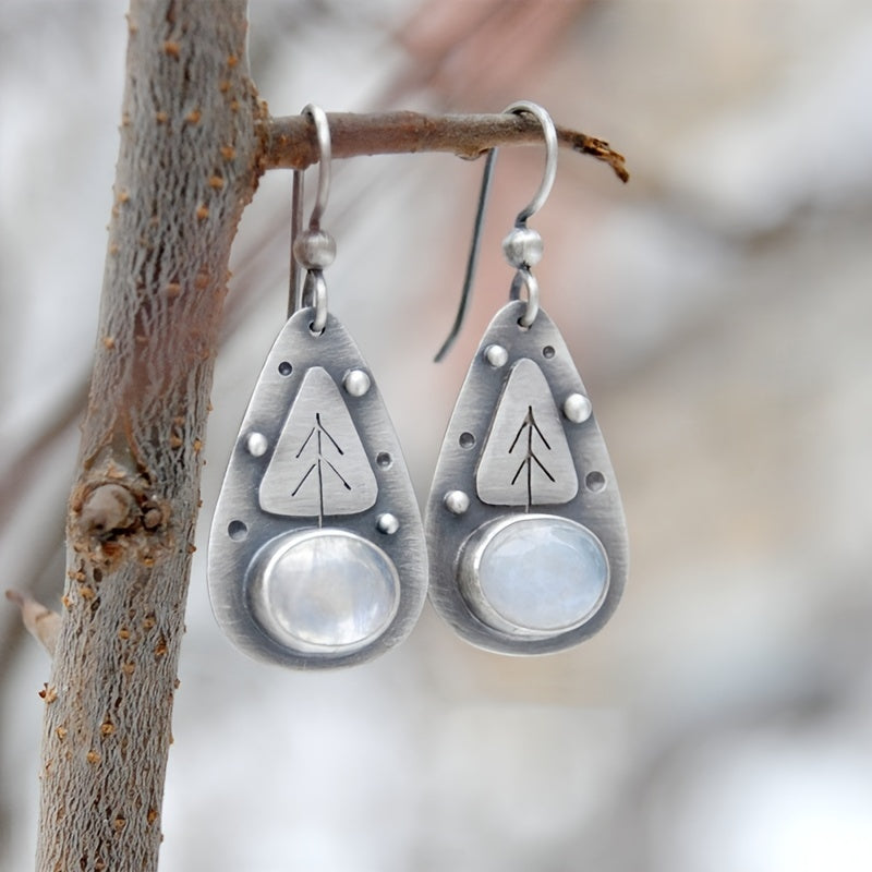 Vintage leaf-shaped silver drop dangle earrings made from zinc alloy, featuring intricate detailing and a lightweight design.