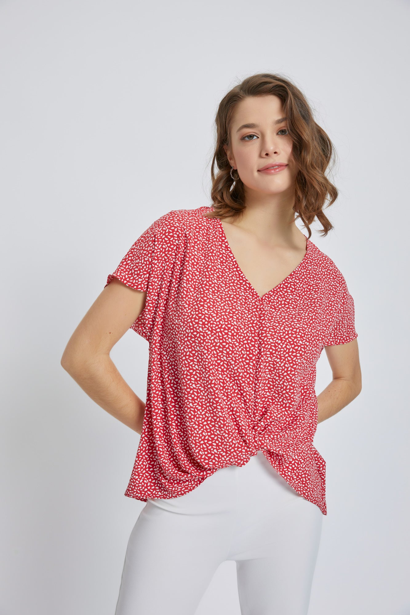 A stylish V-Neck Short Sleeve Wrap Front Top for Women featuring a knot detail at the waist, perfect for casual or dressy occasions.