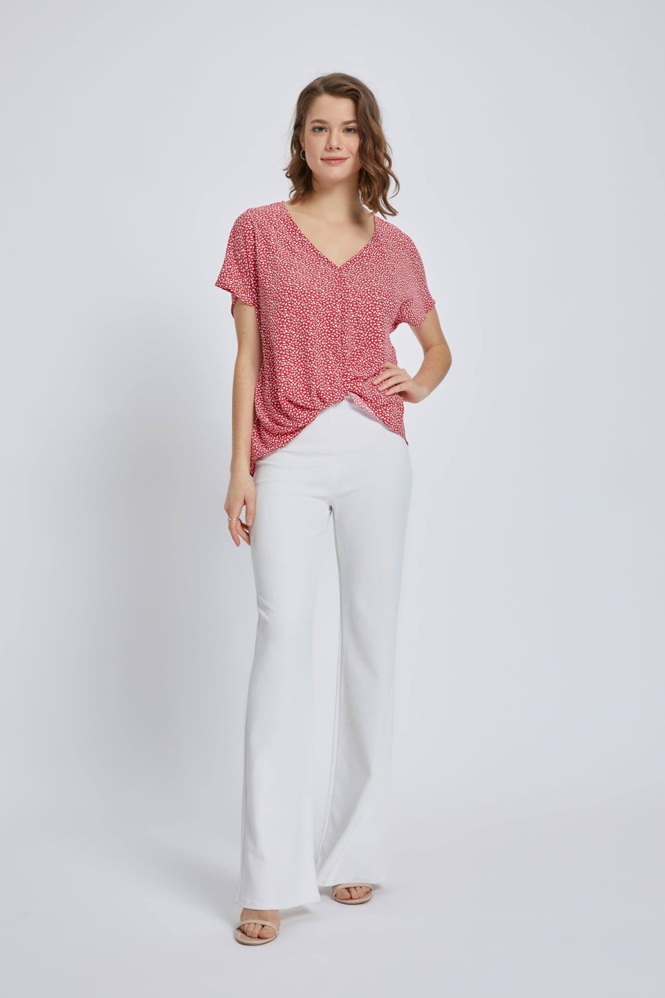 A stylish V-Neck Short Sleeve Wrap Front Top for Women featuring a knot detail at the waist, perfect for casual or dressy occasions.