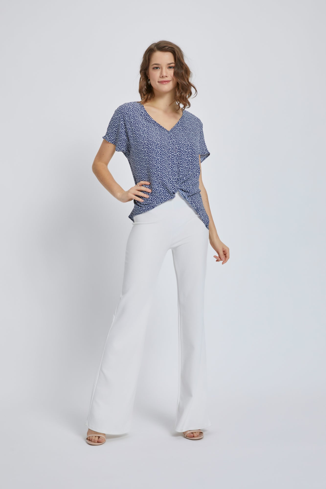 A stylish V-Neck Short Sleeve Wrap Front Top for Women featuring a knot detail at the waist, perfect for casual or dressy occasions.