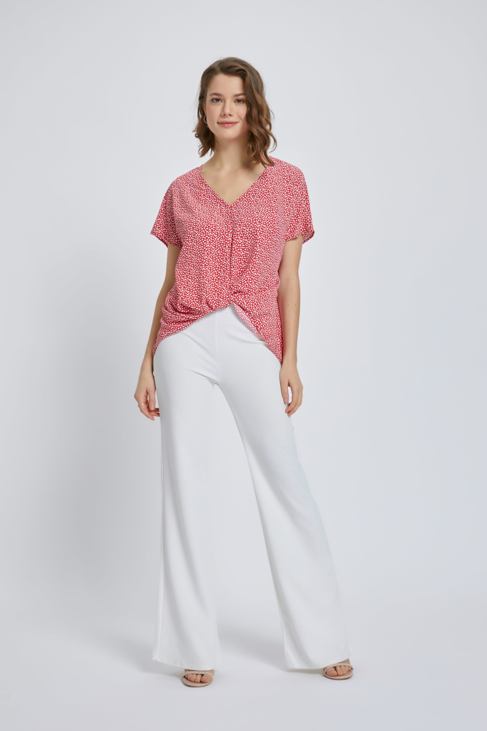 A stylish V-Neck Short Sleeve Wrap Front Top for Women featuring a knot detail at the waist, perfect for casual or dressy occasions.