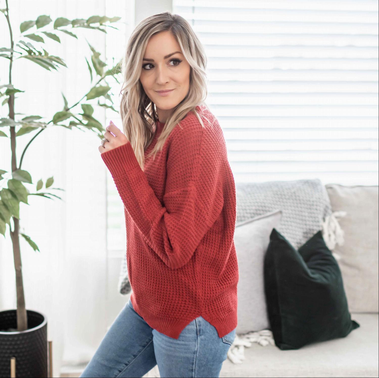 Waffle Knit Round Neck Long Sleeve Sweater featuring a side slit, ribbed cuffs, and a relaxed fit, perfect for fall fashion.