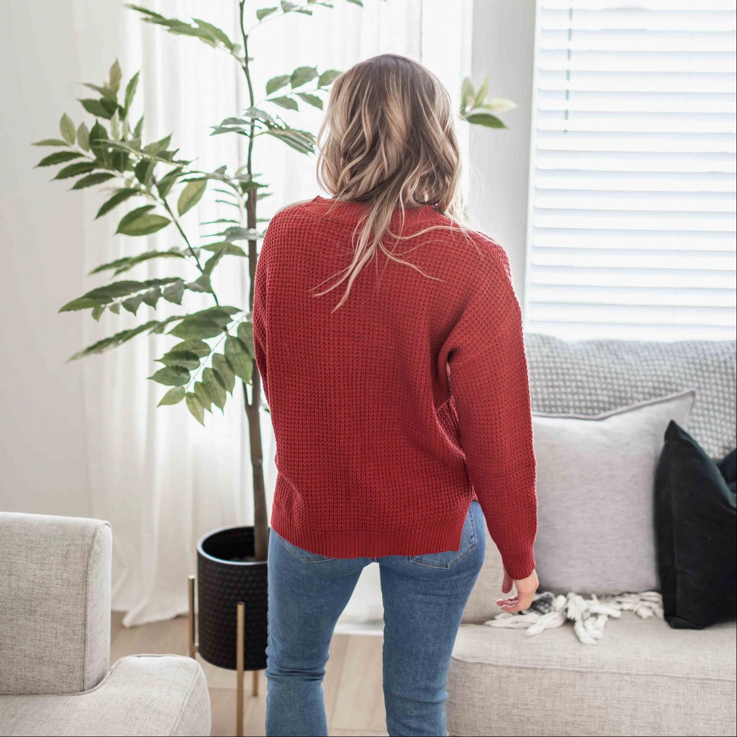 Waffle Knit Round Neck Long Sleeve Sweater featuring a side slit, ribbed cuffs, and a relaxed fit, perfect for fall fashion.