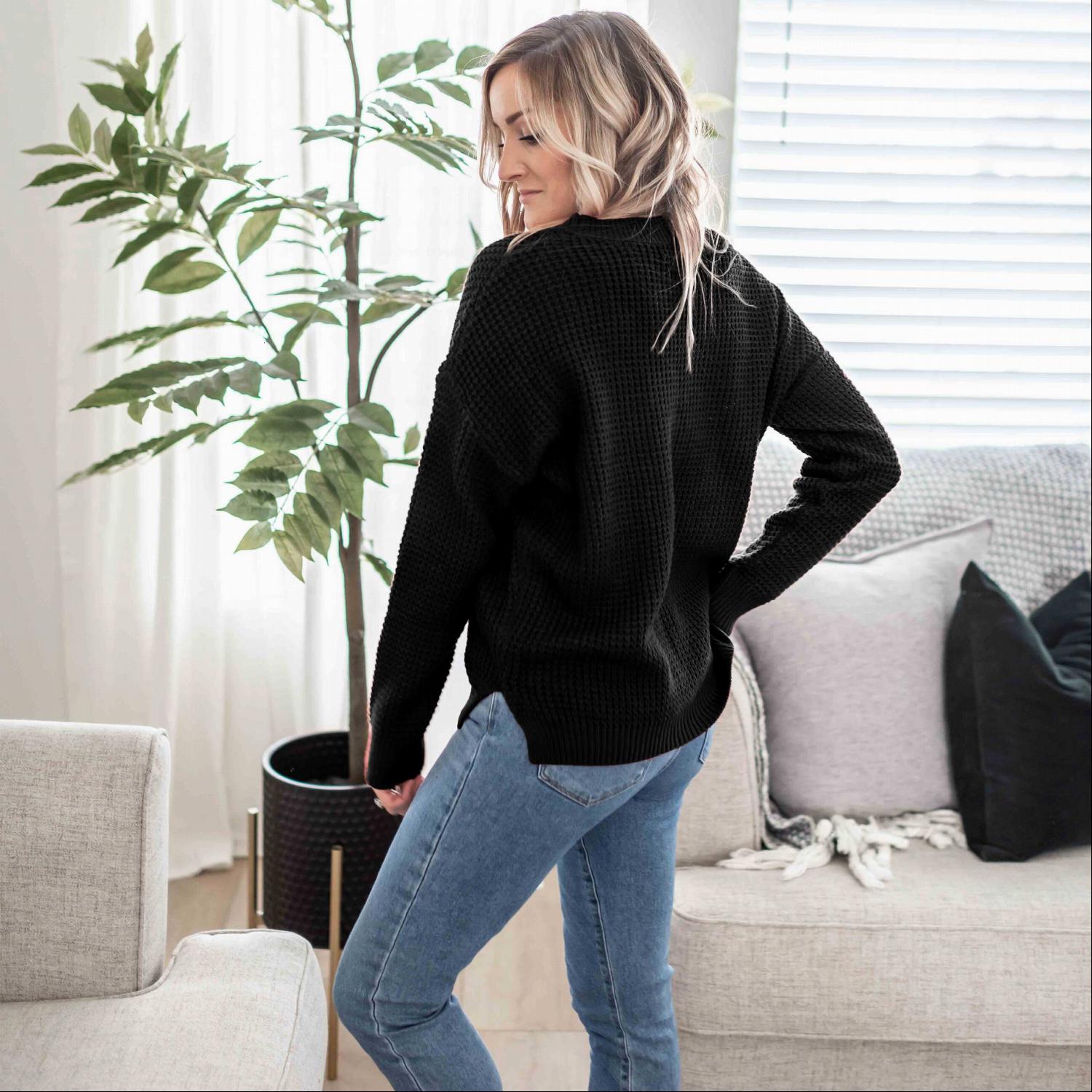 Waffle Knit Round Neck Long Sleeve Sweater featuring a side slit, ribbed cuffs, and a relaxed fit, perfect for fall fashion.