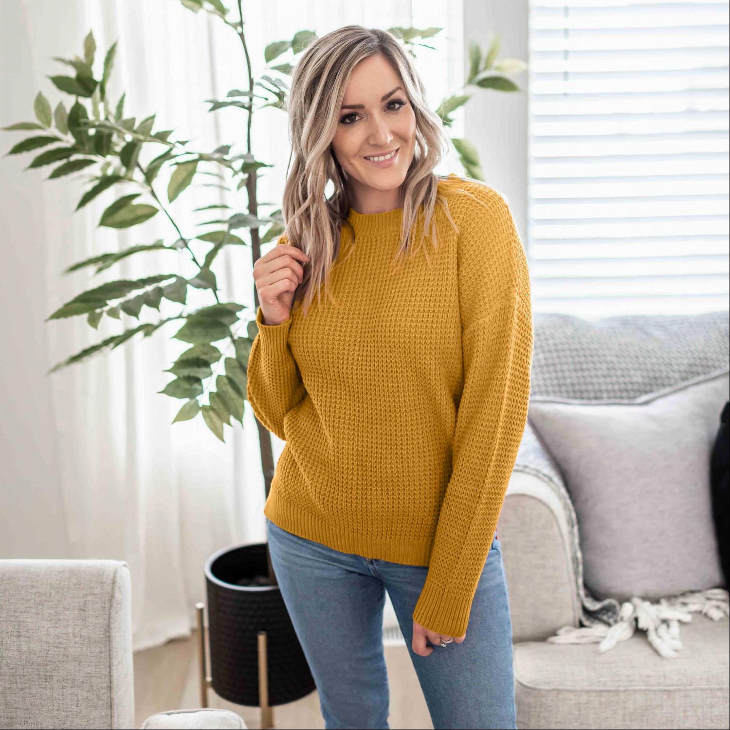 Waffle Knit Round Neck Long Sleeve Sweater featuring a side slit, ribbed cuffs, and a relaxed fit, perfect for fall fashion.