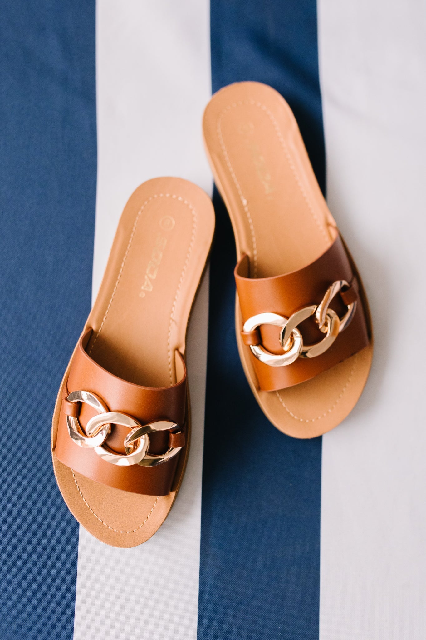 Wander Often Slides in Brown featuring faux leather and chic chain detailing, perfect for summer wear.