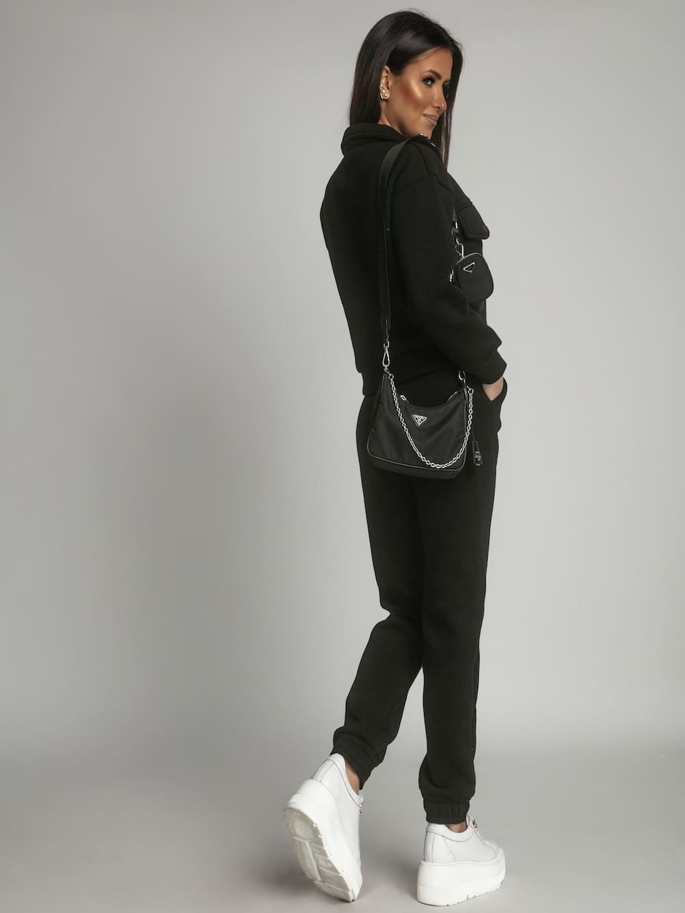 Warm women's katana sweatpants set in black, showcasing a sporty and stylish design suitable for colder weather.